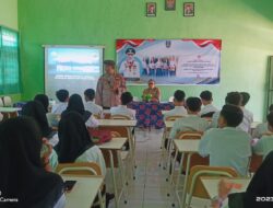 Polsek Grujugan Melaksanakan Giat Sosialisasi Kenakalan Remaja dan Bahaya Narkoba di SMKN 1 Grujugan