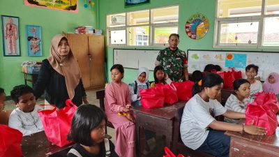 Babinsa Bondowoso Kawal Distribusi 1.190 Paket Makan Gratis ke 15 Sekolah,Program SPPG Disambut Hangat