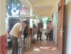Babinsa Kodim 0822 Dampingi Pendistribusian 3.107 Paket Makan Bergizi Gratis di Pujer