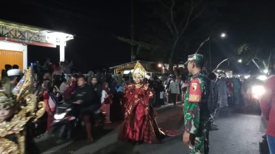 ​Kirab Lampion: Babinsa Kejawan Kawal Pengamanan Ribuan Warga